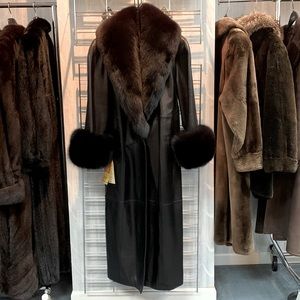 Black 50” long leather coat with detachable black fox collar and cuffs